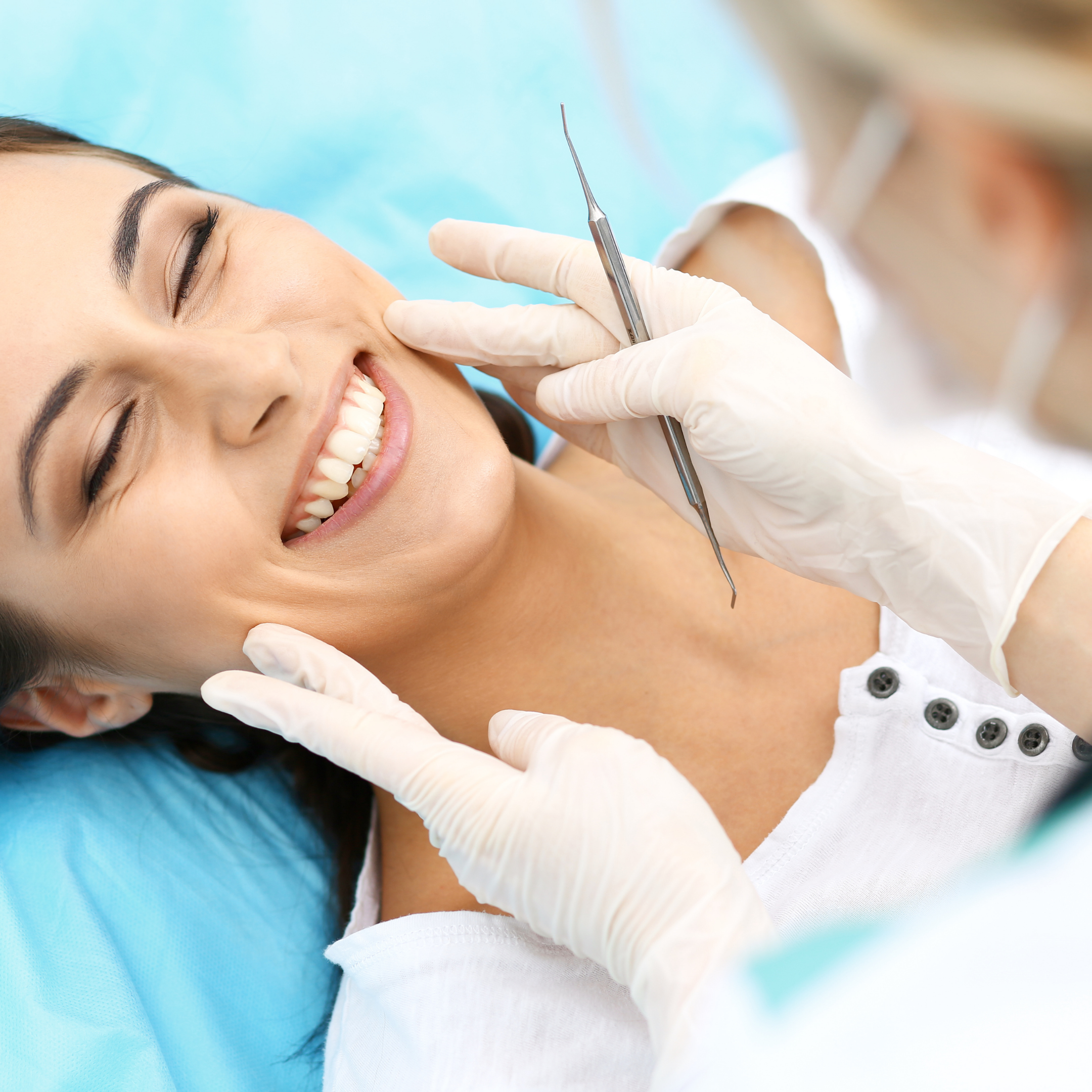 dentista e paciente sorrindo